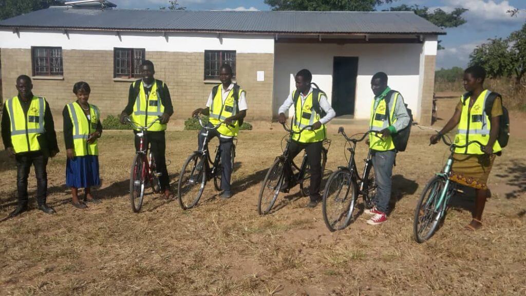 hired health facilitators stationed on bicycles