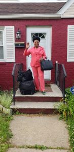 Pamela Haynes outside her home before leaving for the airport.