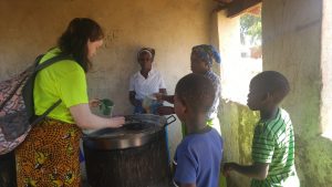 Bethany Hogan serving food to schoolchildren